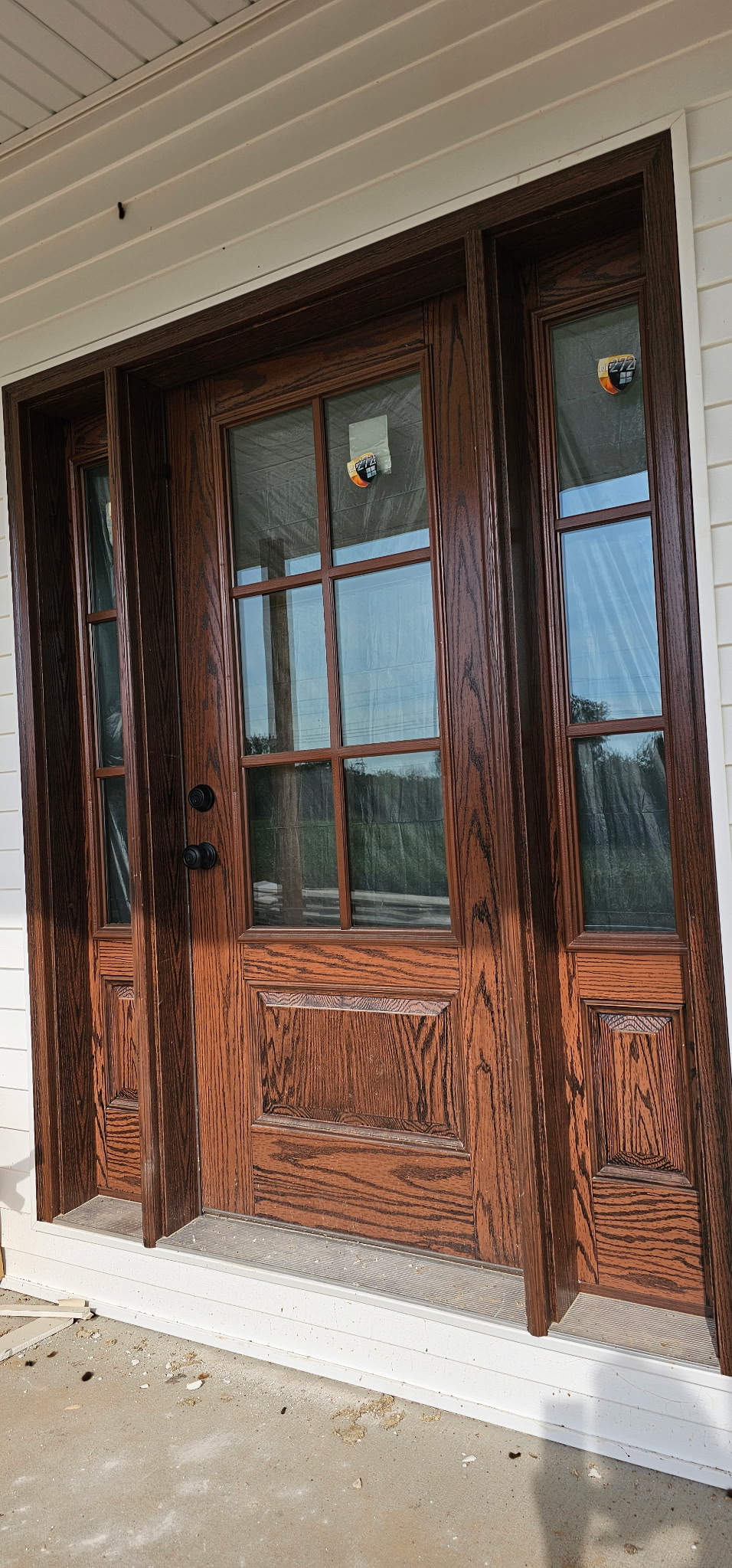 Stained Oak Entry With Sidelights