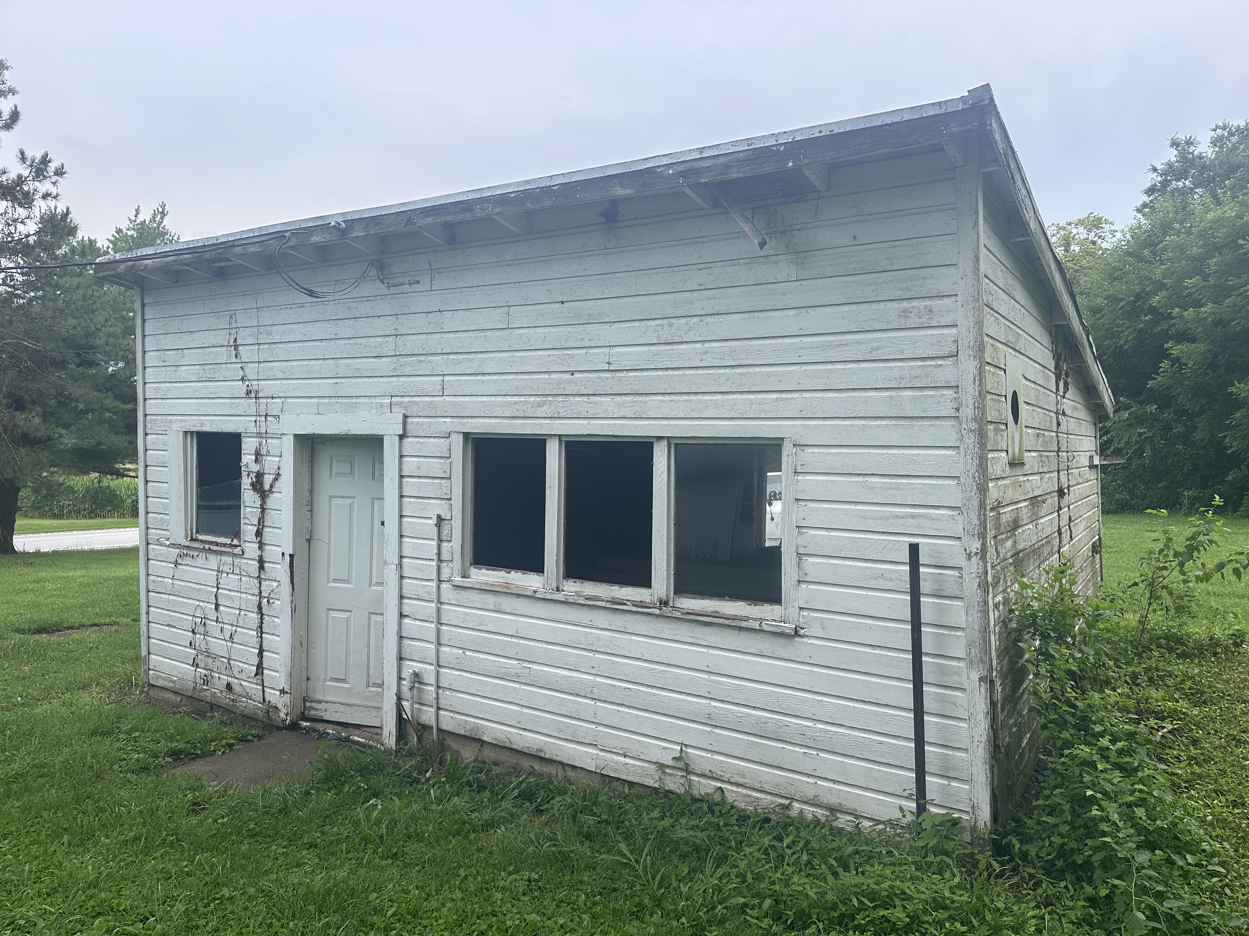 Before Outbuilding Front Damaged
