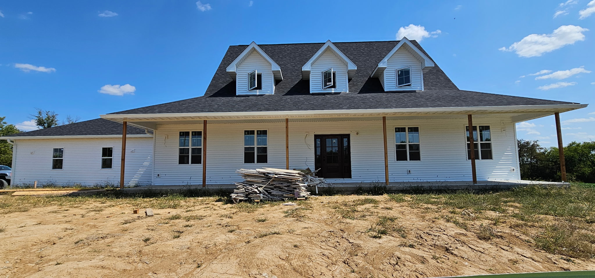 Farmhouse Wraparound Porch Dormers